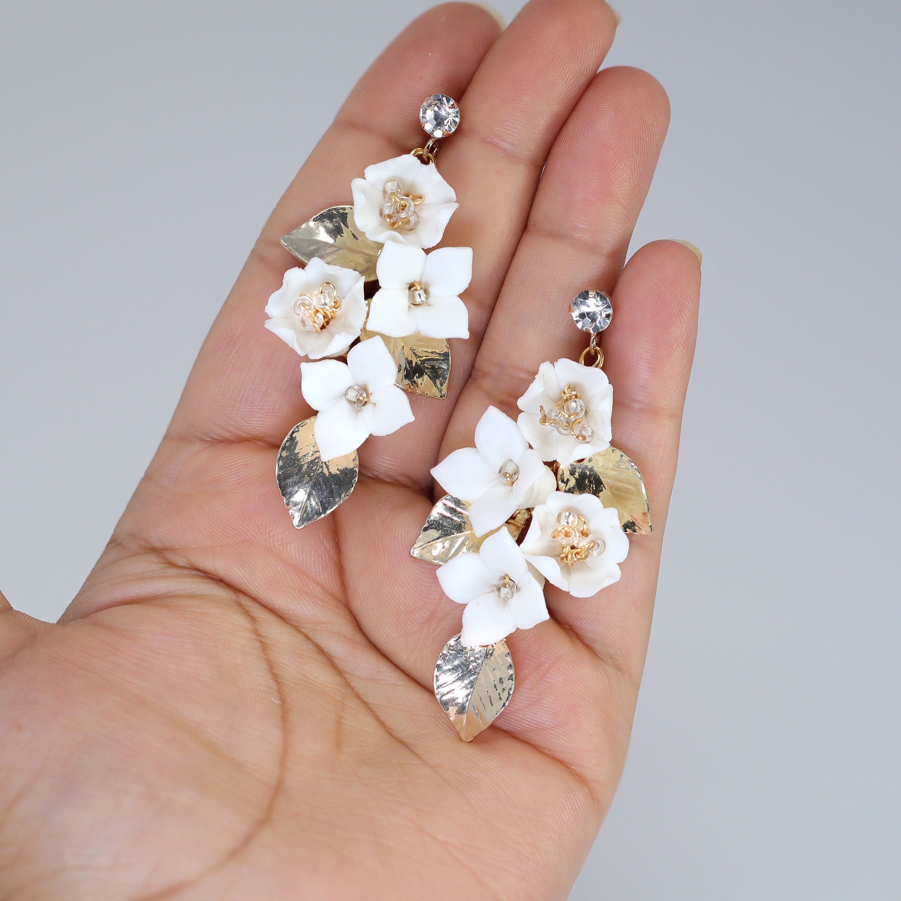 Clip on Ceramic White Flower Crystal And Gold Leaves Earrings, Long Bridal Jewelry, Flower Bridal Earrings, Statement Earrings