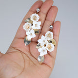 Clip on Ceramic White Flower Crystal And Gold Leaves Earrings, Long Bridal Jewelry, Flower Bridal Earrings, Statement Earrings