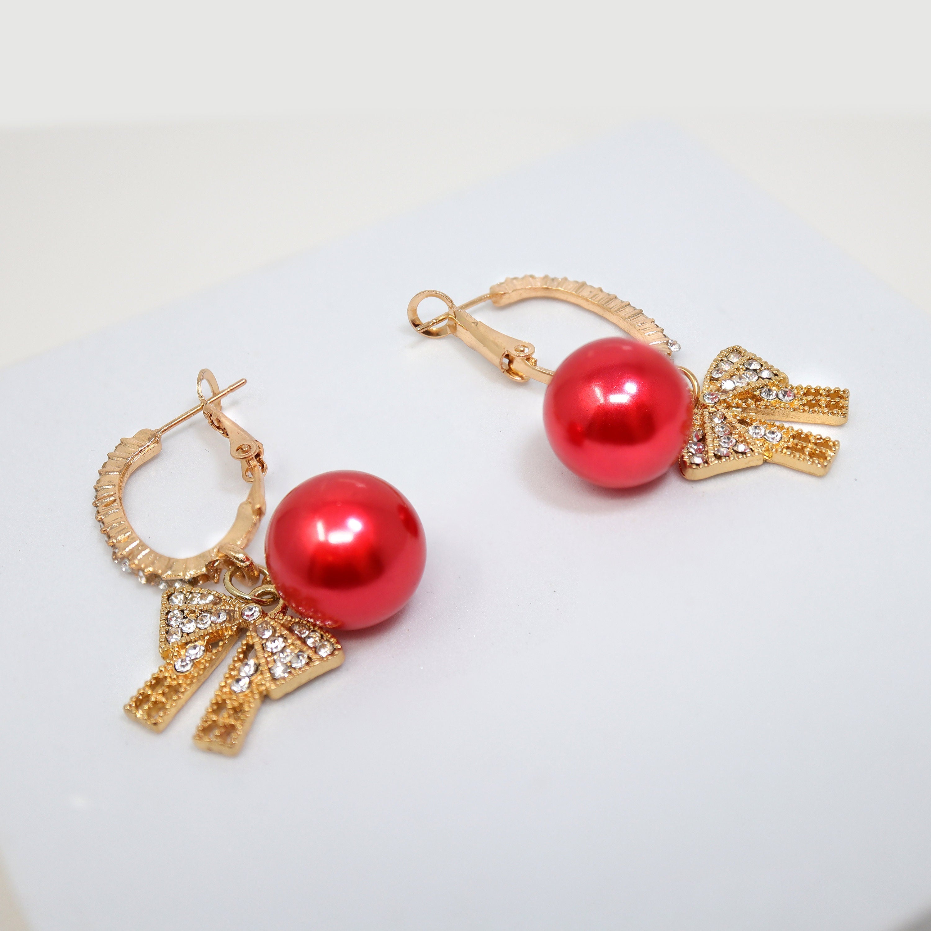 Golden Holiday Bow Red Drop Christmas Themed earrings, Red Gold Christmas Earrings Statement Christmas earrings.