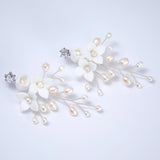 Ivory Serenade Bridal Earrings: White Ceramic Flower With Natural Pearl Leaves