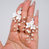 Ivory Serenade Bridal Earrings: White Ceramic Flower With Natural Pearl Leaves