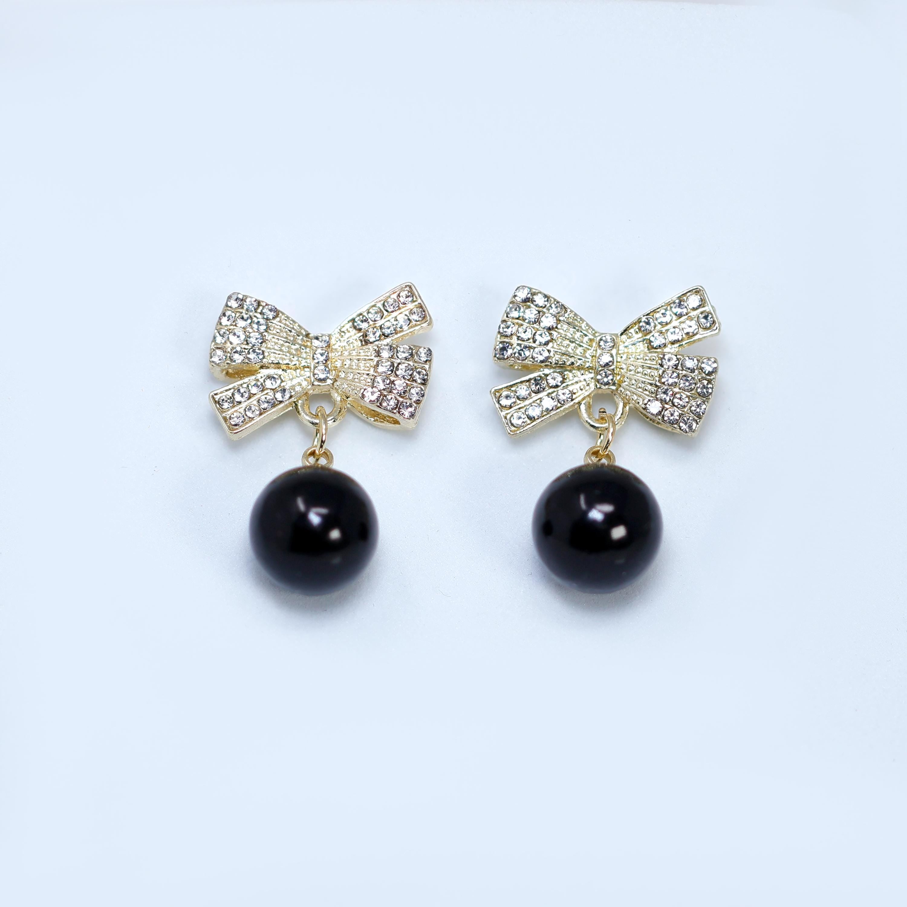 Golden Crystal Bow With white and Black Drop Earrings, Pearl Drop Earrings, Statement earrings.