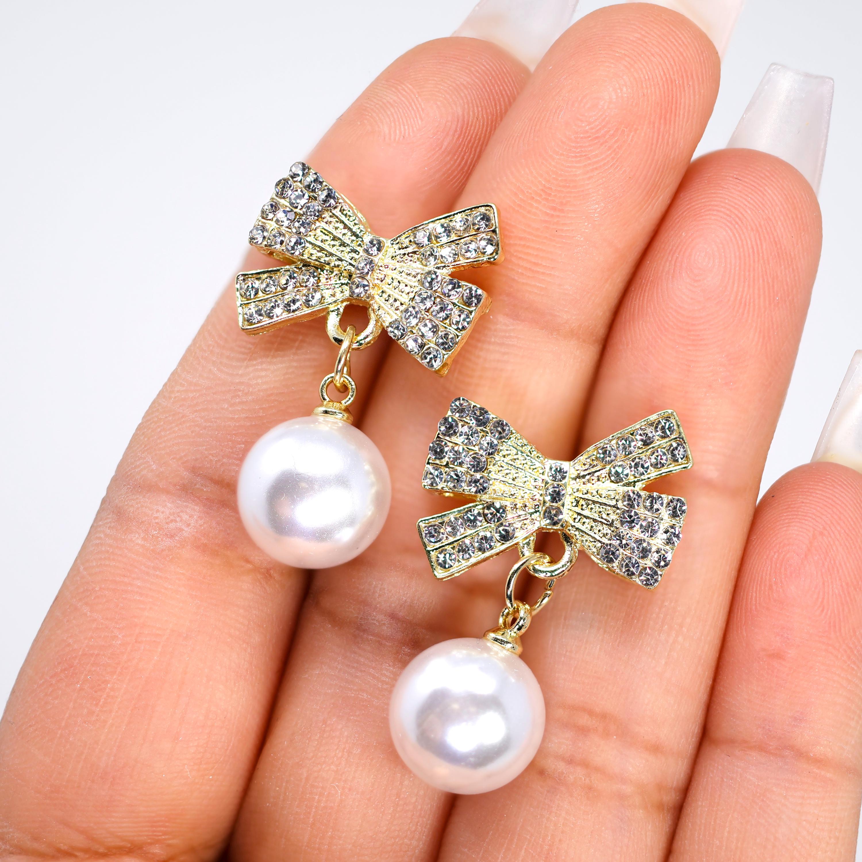 Golden Crystal Bow With white and Black Drop Earrings, Pearl Drop Earrings, Statement earrings.