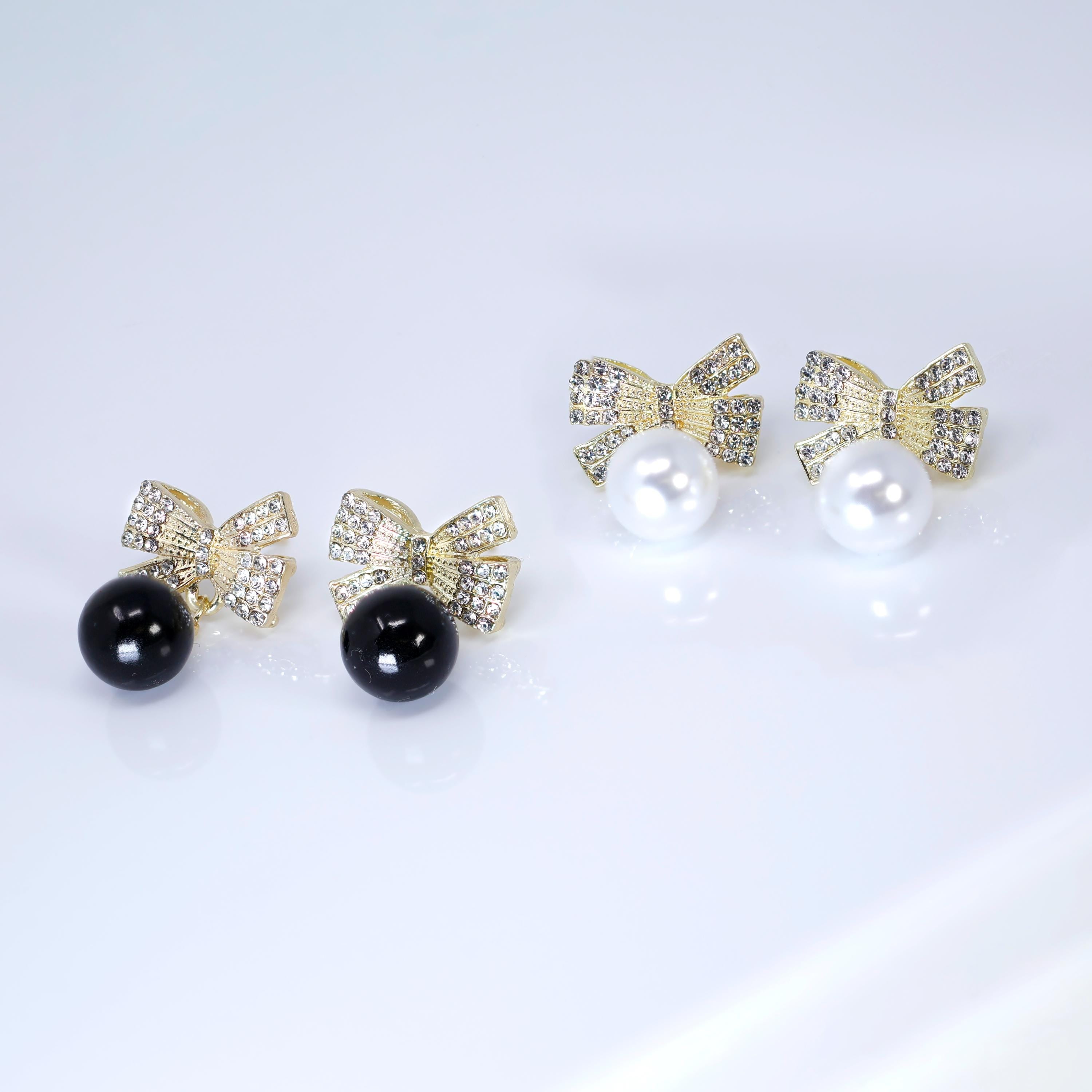 Golden Crystal Bow With white and Black Drop Earrings, Pearl Drop Earrings, Statement earrings.