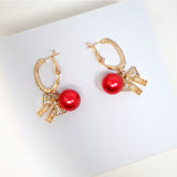 Golden Holiday Bow Red Drop Christmas Themed earrings, Red Gold Christmas Earrings Statement Christmas earrings.