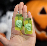 Neon Green Reflective Skull In A Jar Halloween Dangle Earrings, Long Halloween Earrings, Spooky Statement earrings.