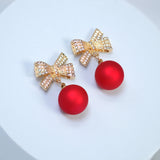 Golden Crystal Bow With Red Bow Drop Christmas earrings, Red Gold Christmas Earrings Statement Christmas earrings.
