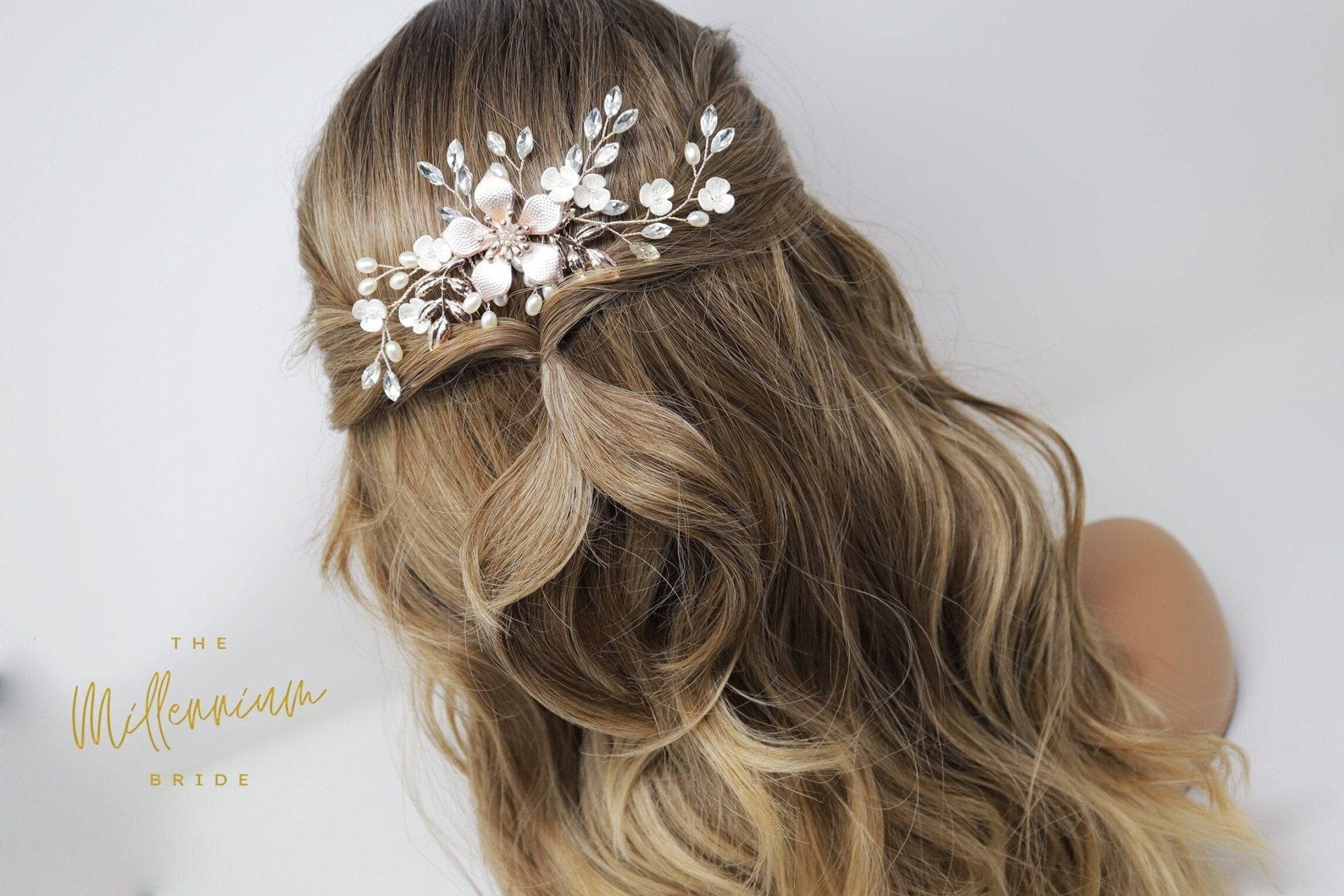https://themillenniumbride.com/cdn/shop/products/swarovski-crystals-pearls-rhinestones-floral-bridal-hair-piece-bridal-hair-accessories-wedding-hair-accessory-bridal-hair-comb-182789.jpg?v=1681418628